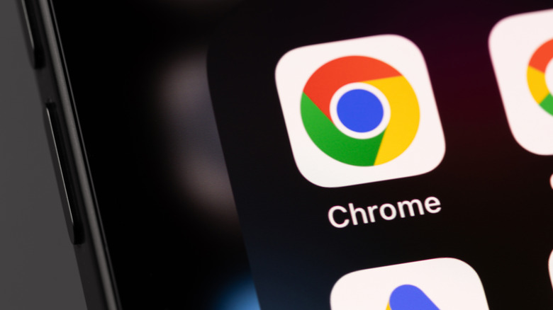 Close-up of a smartphone screen showing the Google Chrome app icon with its multicolored circle logo and the label "Chrome."