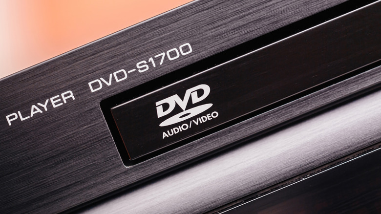 Photo of a DVD player with a DVD logo on it.