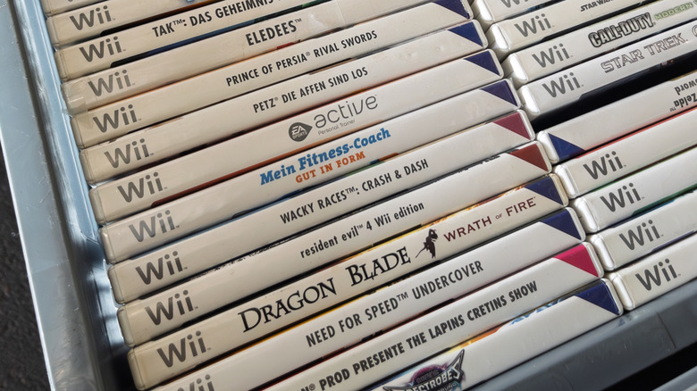 Rows of Wii game boxes with their titles printed on the spine