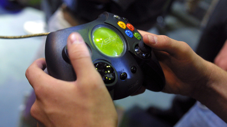 Hands holding the original Xbox controller