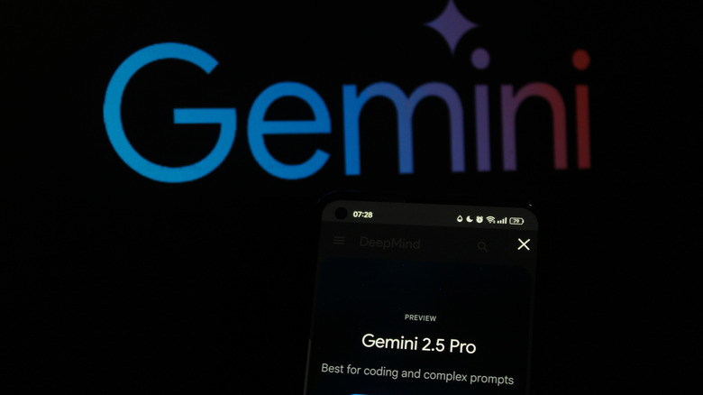 Gemini logo with Google Gemini 2.5 Pro model showing on mobile phone