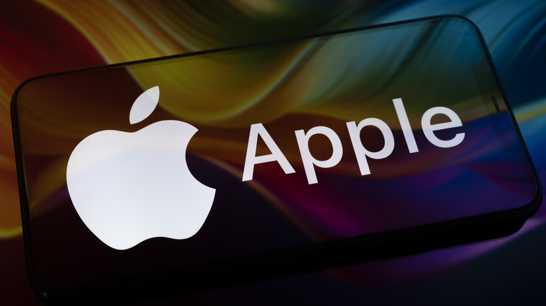 The Apple logo on a smartphone