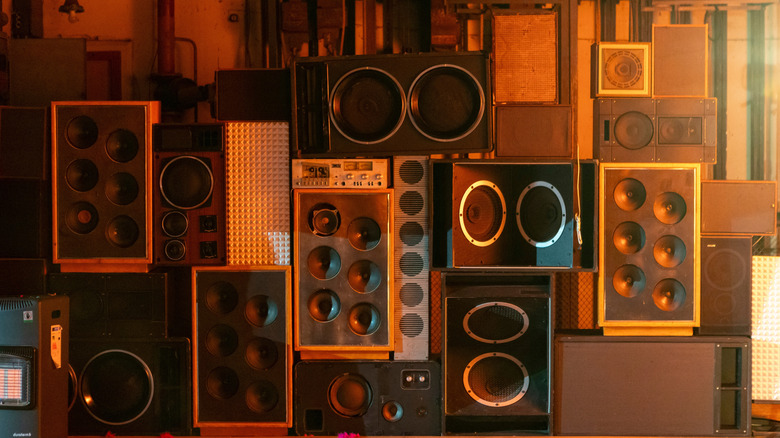 Various audio speakers stacked up.