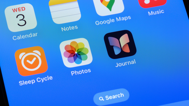 An iPhone screen displaying a number of icons including the Photos app