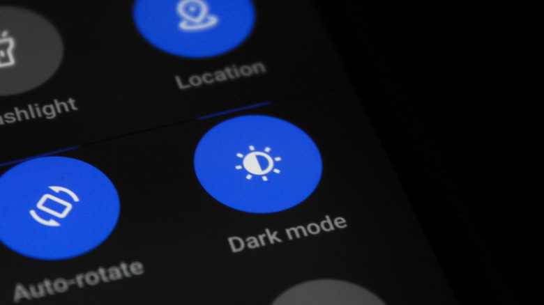 Close-up of phone screen showing the Dark Mode setting