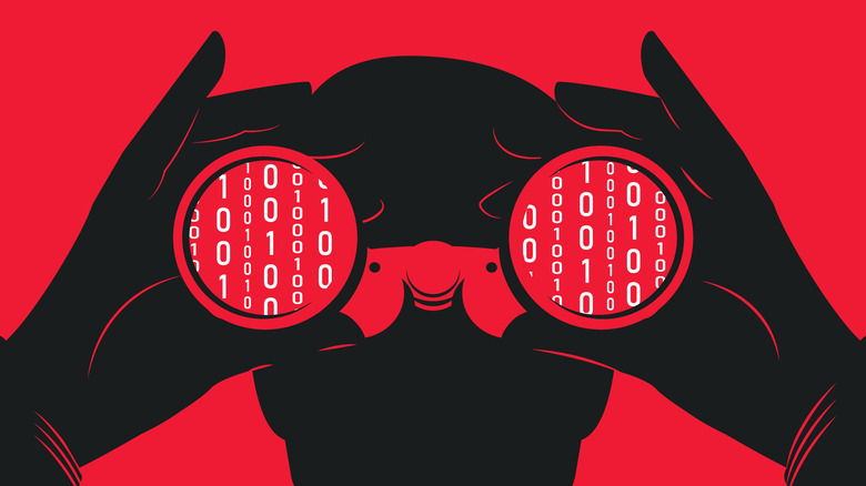 Stranger looking through binoculars at binary code.