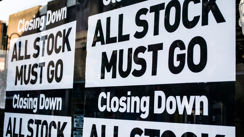business window sign that reads Closing Down, All Stock Must Go
