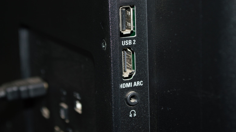 An HDMI ARC receiver on the back of a TV