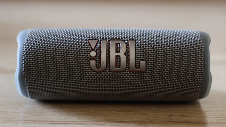 JBL portable speaker close-up on wooden surface