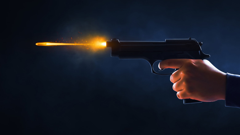 Firing gun with bullet trail
