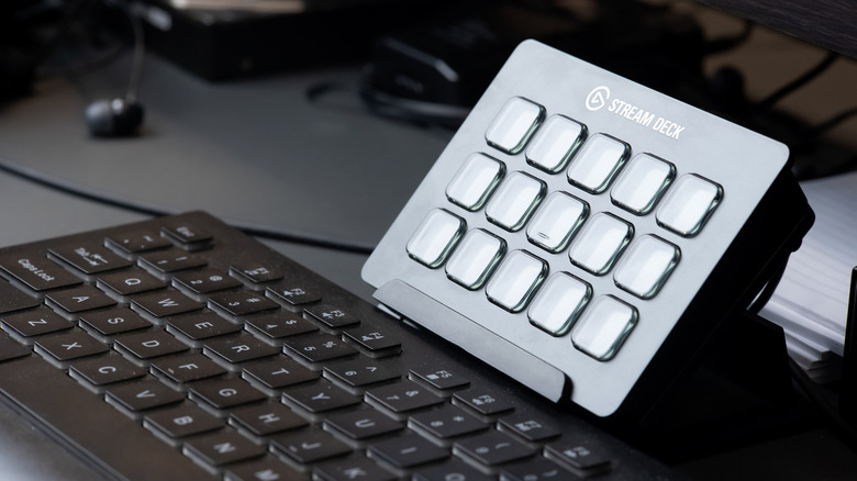 Stream Deck device on desk behind a keyboard