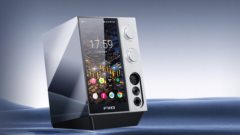 The FiiO R9 music player sitting on an abstract surface