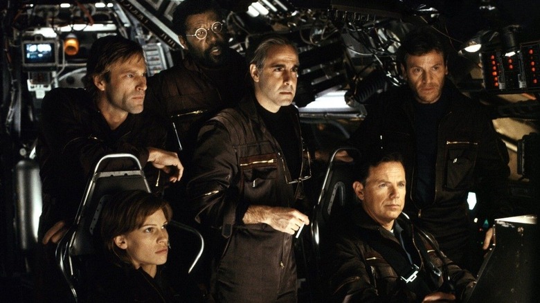 The scientist team together in the ship