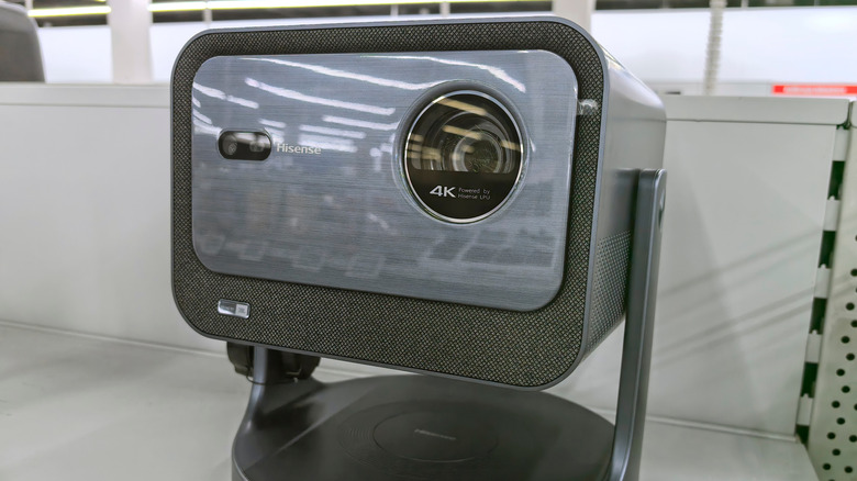A Hisense 4K projector on display at a tech expo.