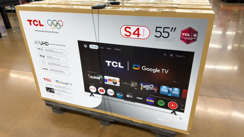 TCL TVs on a pallet in a Walmart