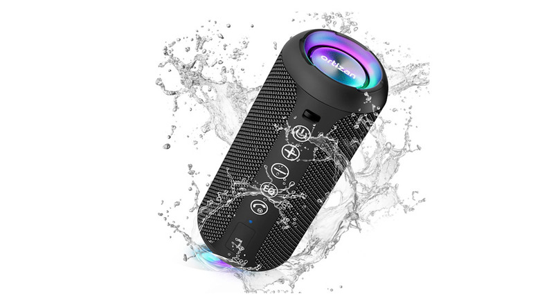Ortizan Portable Speaker playing while surrounded by water