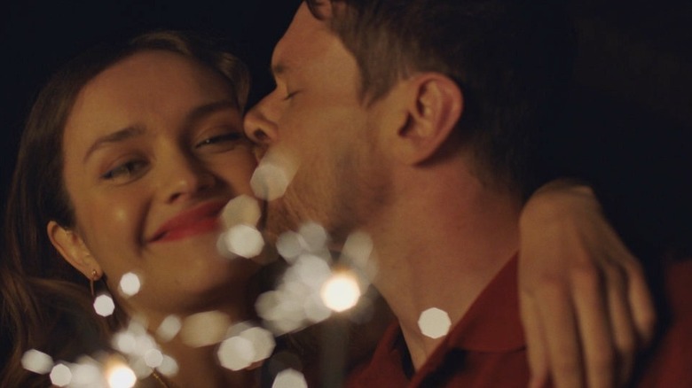 Jude kissing Emma on the cheek
