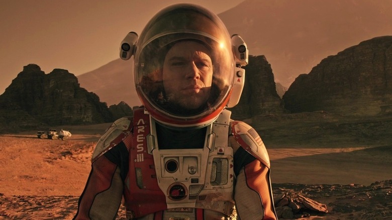 Mark Watney (Matt Damon) standing on Mars in 