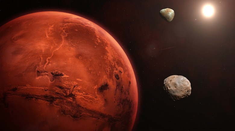 A rendering of Mars, Phobos, Deimos, and the Sun.