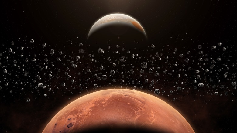 From top to bottom: A rendering of Jupiter, the main asteroid belt, and Mars.