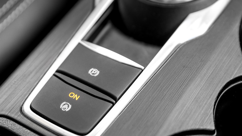 Close-up photo of an electric parking brake.