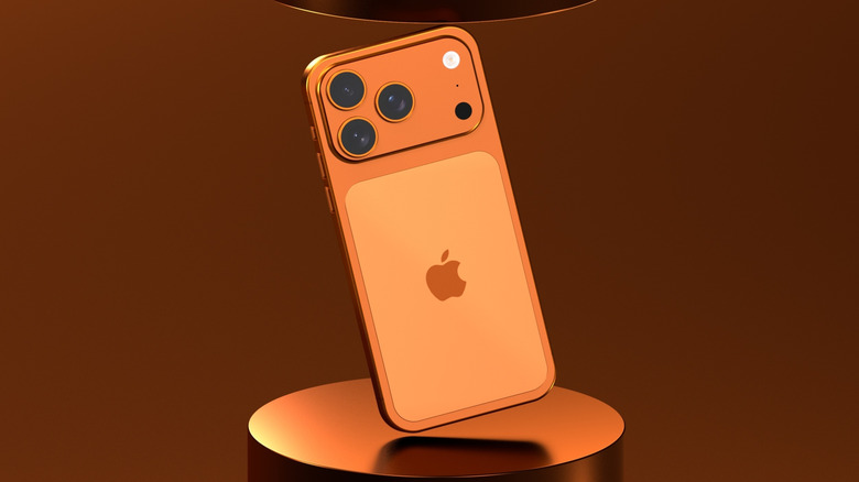 Orange iPhone 17 Pro Max in a professional product image.