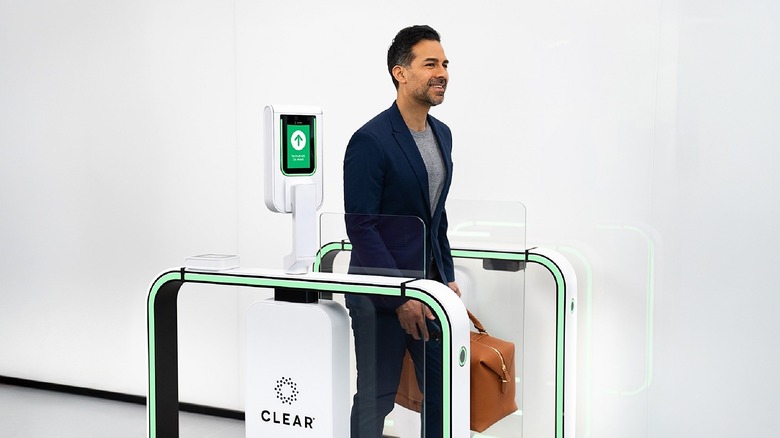 Man passing through Clear eGate.