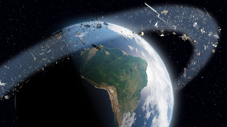 Space junk orbiting the Earth and making it dangerous.