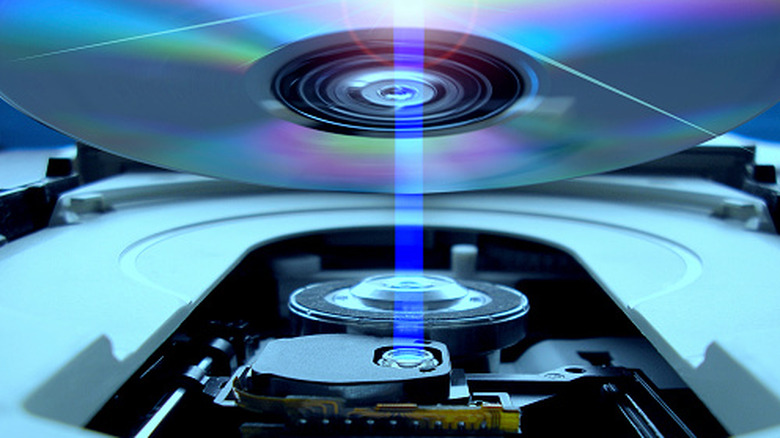 An optical disc inside a player.