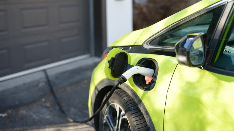 An electric vehicle being charged.