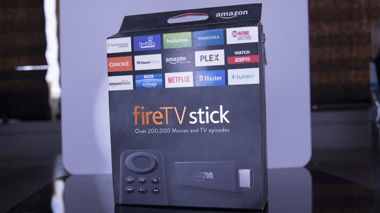 Amazon Fire TV Stick in packaging on a surface