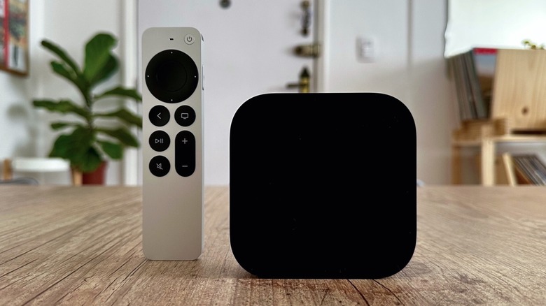 The third-generation Apple TV 4K and the Siri Remote on a table