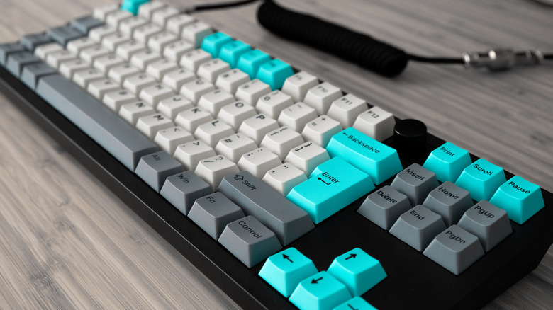 A customized mechanical keyboard on a table.