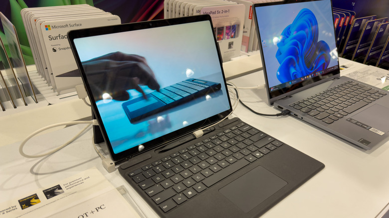 Microsoft Surface devices in a store.