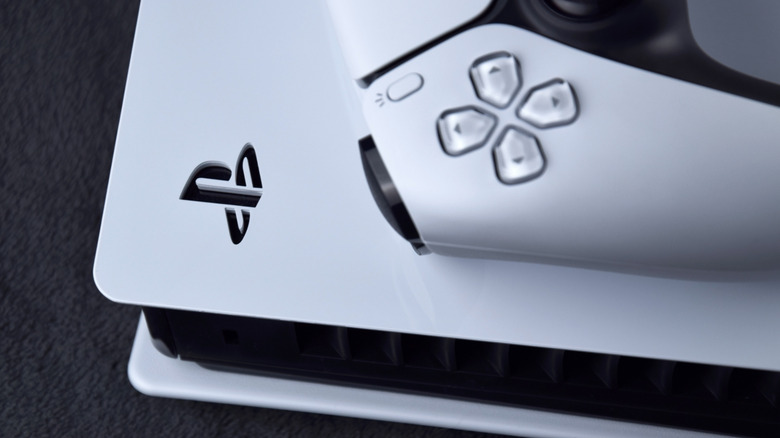 A PlayStation 5 and DualSense controller