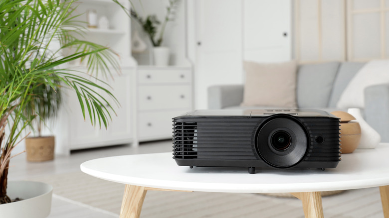 A projector located on a table.
