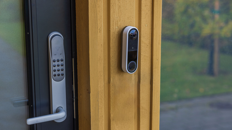 Close-up view of a video doorbell.