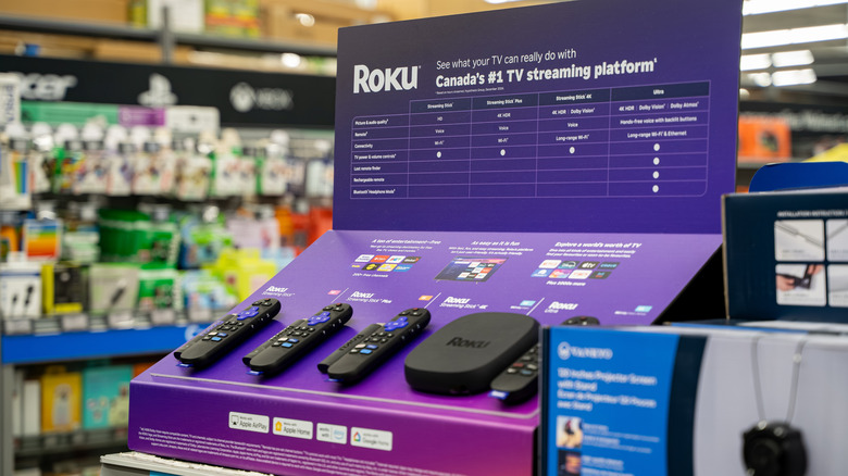 Roku streaming devices on display in retail store.