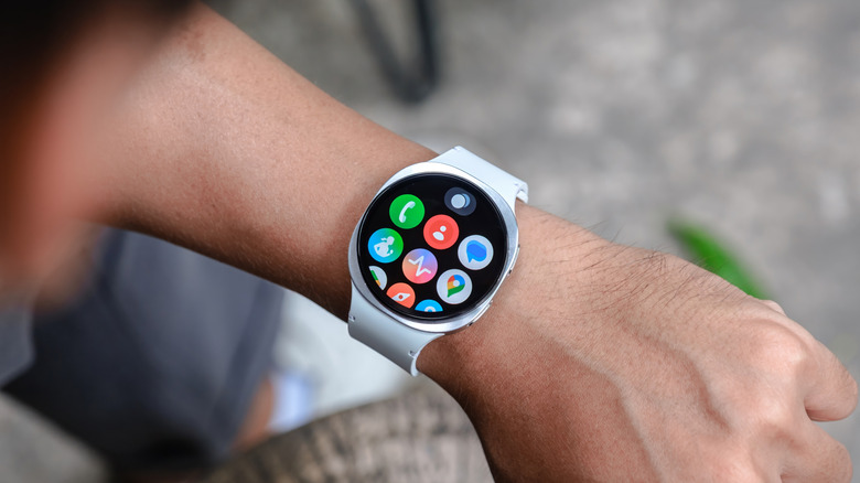 Android smart watch being looked at on wrist