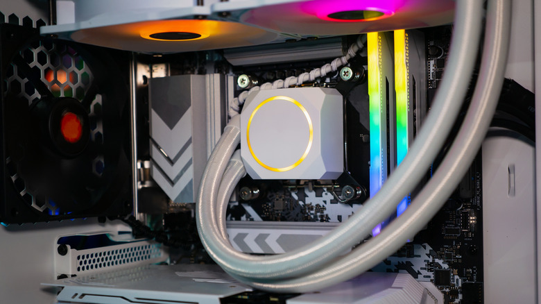 Close up of a custom PC with an AIO cooler, RGB RAM, and more.