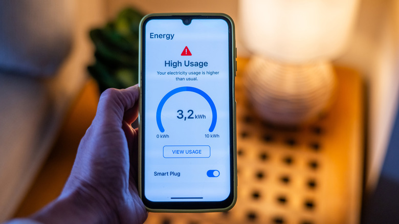 A smart plug app displaying a high energy usage warning.