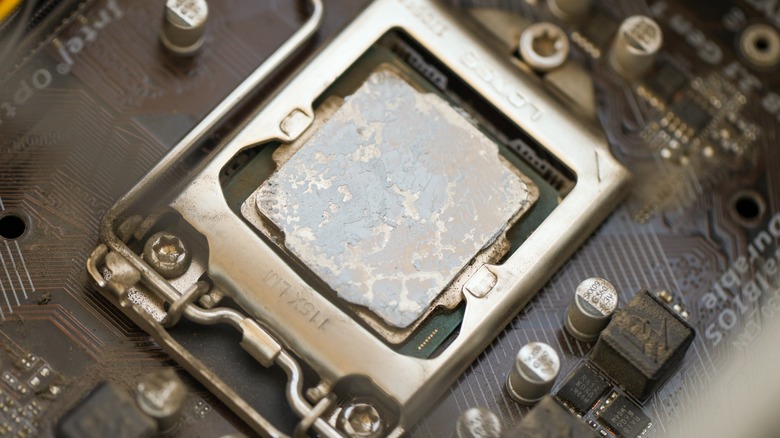 Aged thermal paste on a PC board.