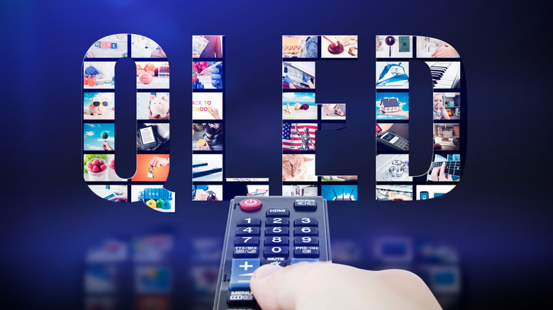 QLED logo is displayed, made up of individual pictures, while a remote is placed in front.