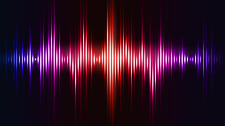 Colorful sound waves on a black background.