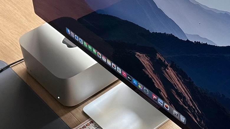 Close-up shot of a Mac Studio and Studio Display on a table