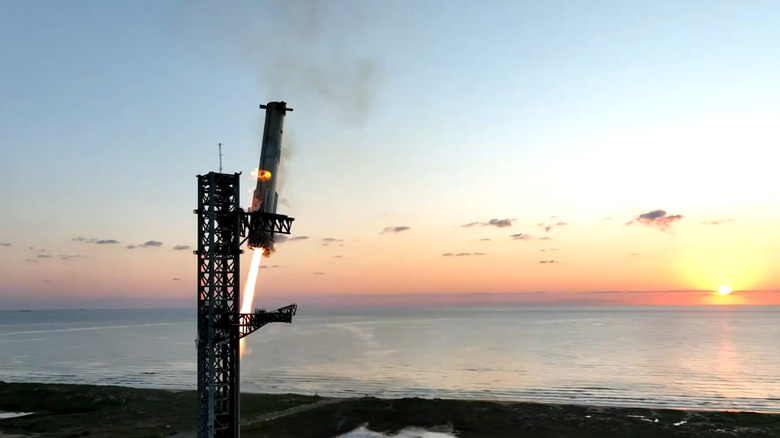 SpaceX's Starship Super heavy booster comes in for its first historic tower catch.