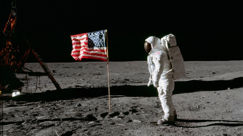 Astronaut Edwin Aldrin Junior moonwalking on the lunar surface.