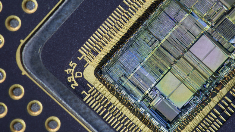 Extreme close-up of a motherboard with wiring and circuitry.