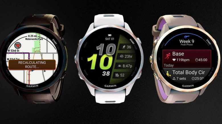 The Garmin Forerunner 970 showing three different watch faces.