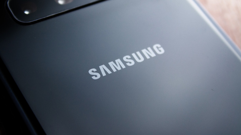 Close-up of Samsung logo on the back of a phone